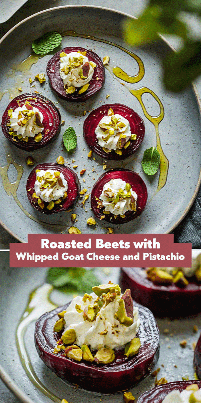 Slices of roasted beets topped with whipped goat cheese and pistachios, garnished with mint leaves, displayed on a gray plate.